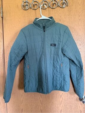 Finisterre women’s firecrest Quilted Jacket in Teal
